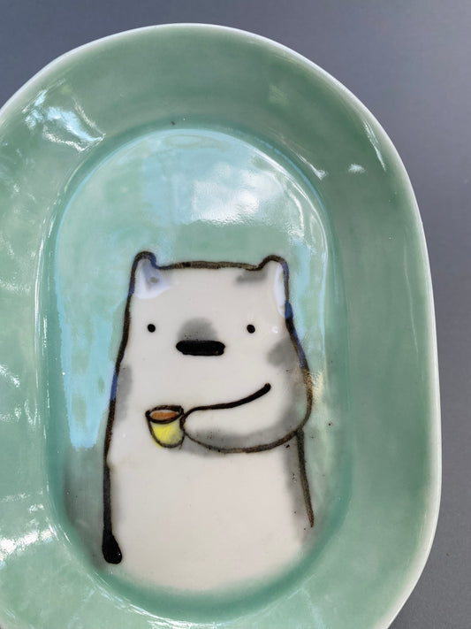 Bear drinking coffee