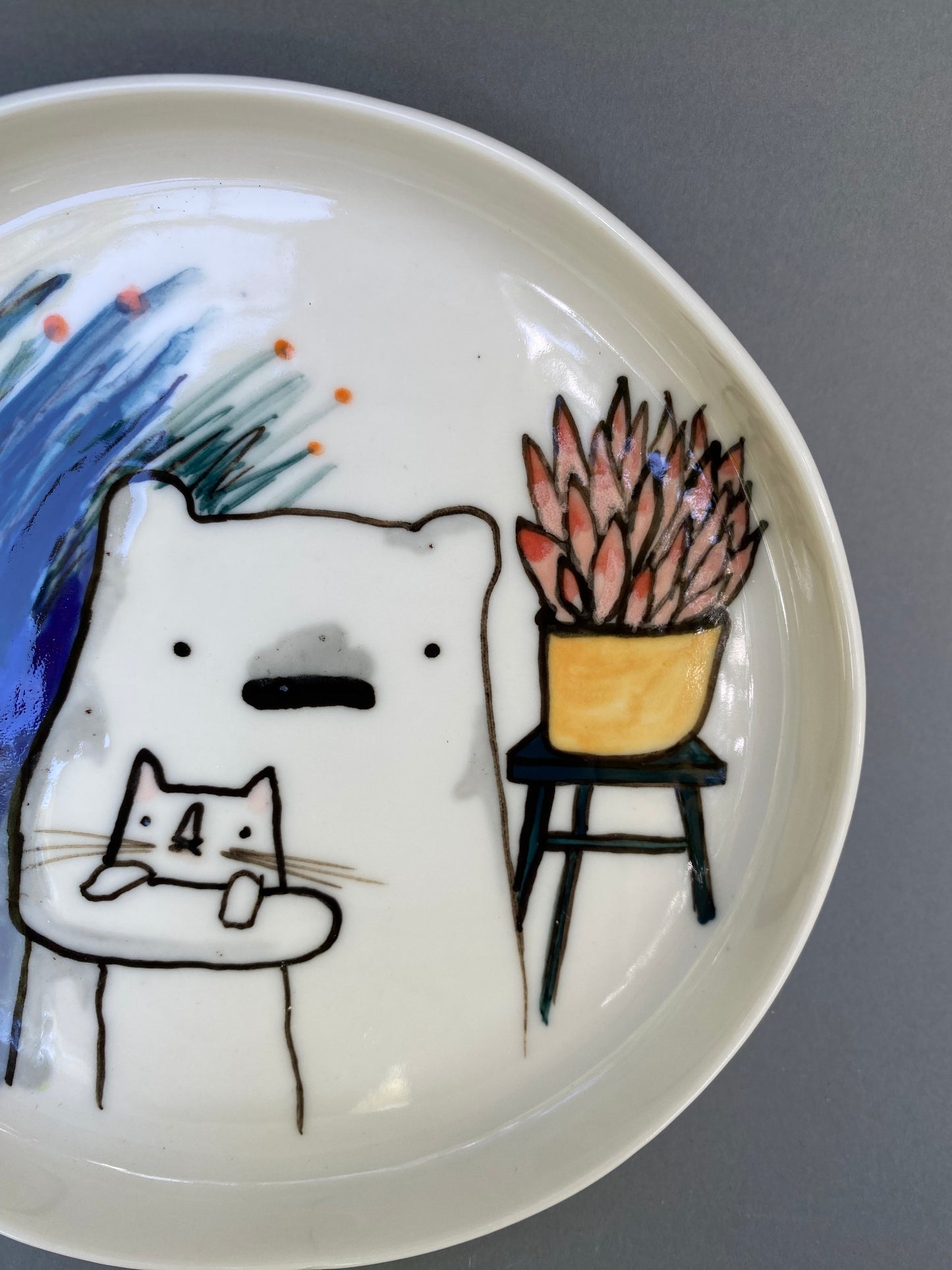 Bear, cat and some plants