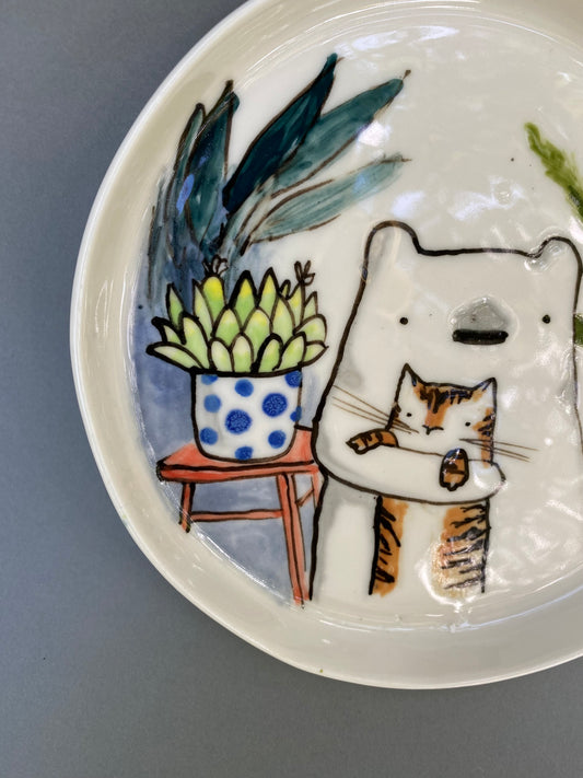 Bear and a tiger cat