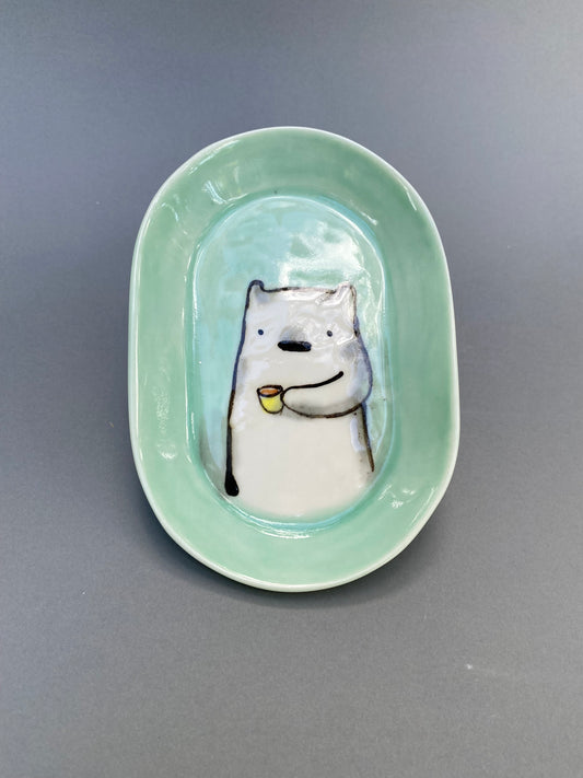Bear drinking coffee