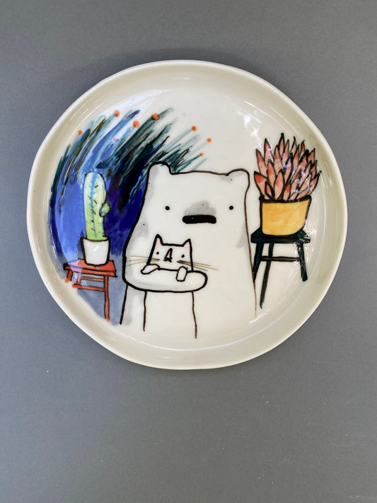 Bear, cat and some plants