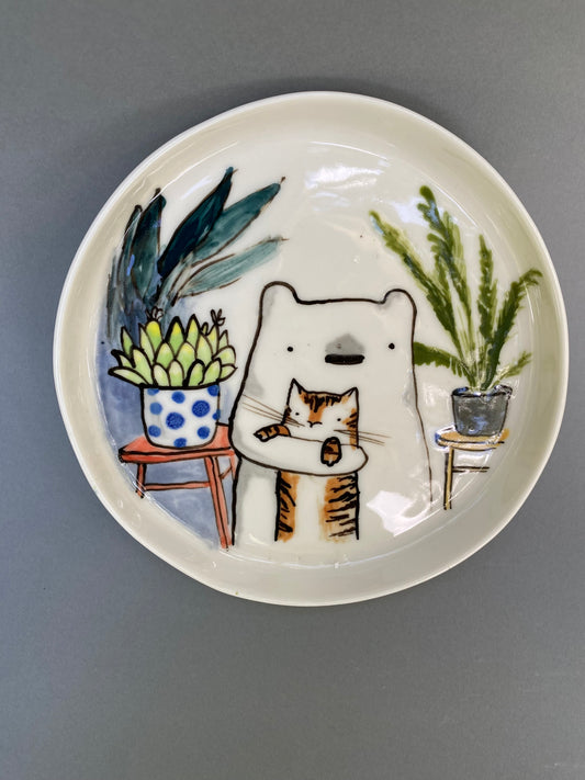 Bear and a tiger cat